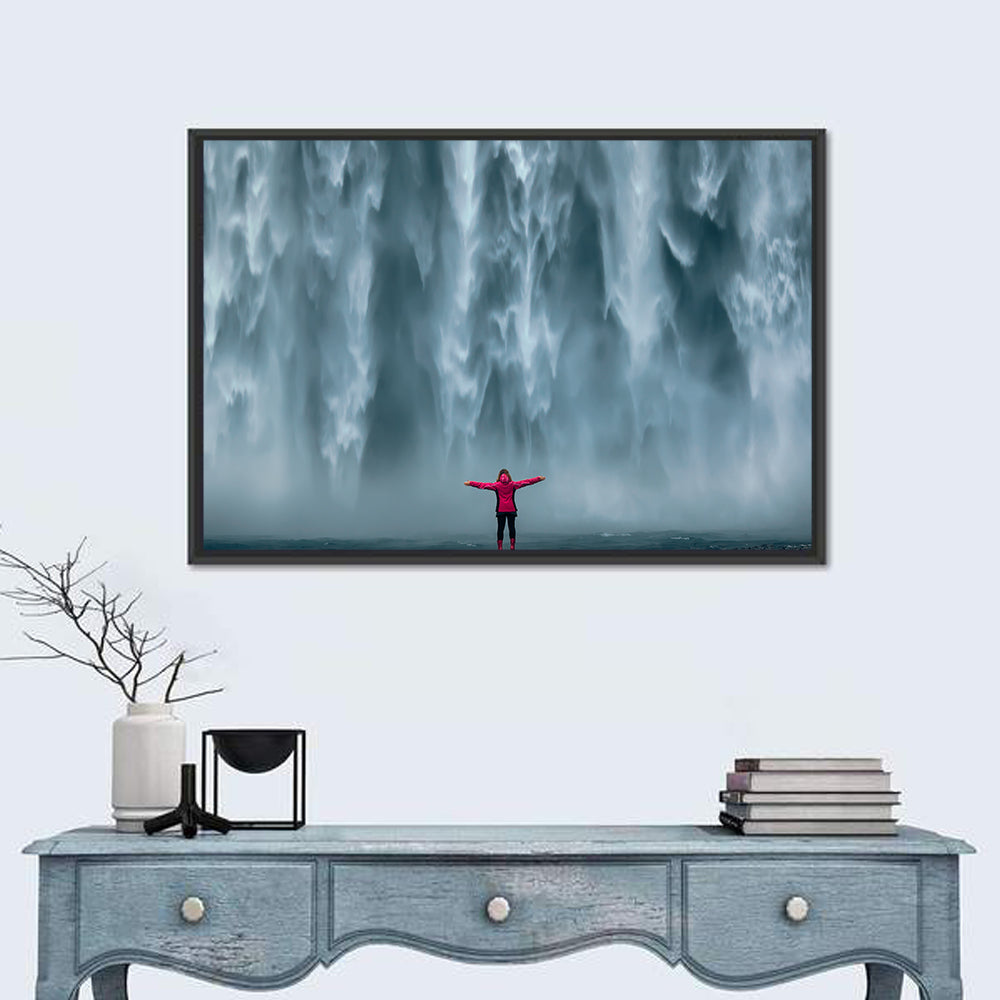 Skogafoss Waterfall with Figure in Pink Wall Art