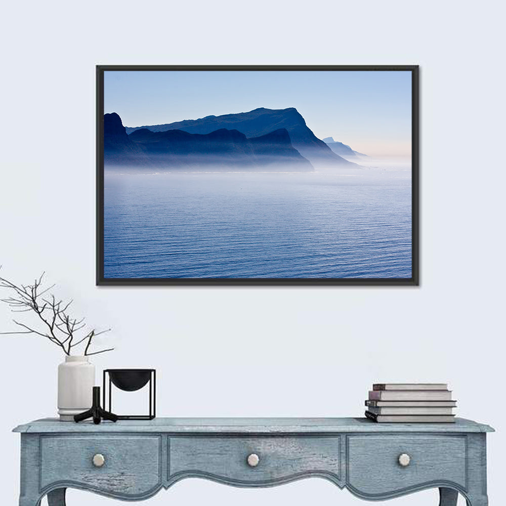 Misty Coastal Cliffs and Mountain Layers Wall Art in a room, landscape
