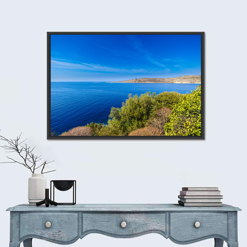 Sunlit Albanian Coastline Wall Art in a room, landscape
