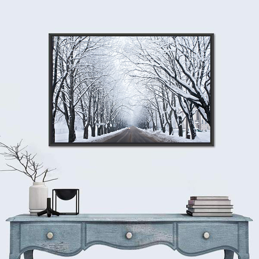 Snowy Road with Distant Headlights Wall Art