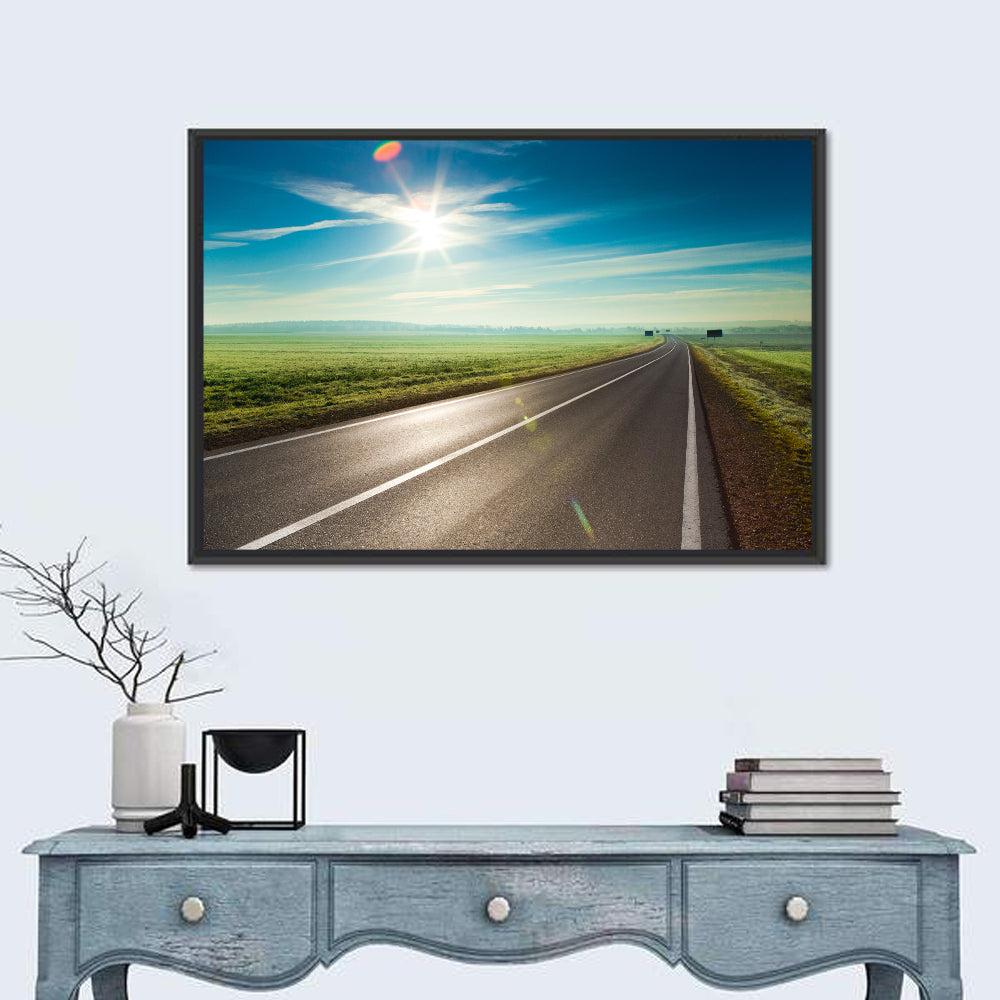 Sunlit Road Through Green Field Wall Art in a room, landscape