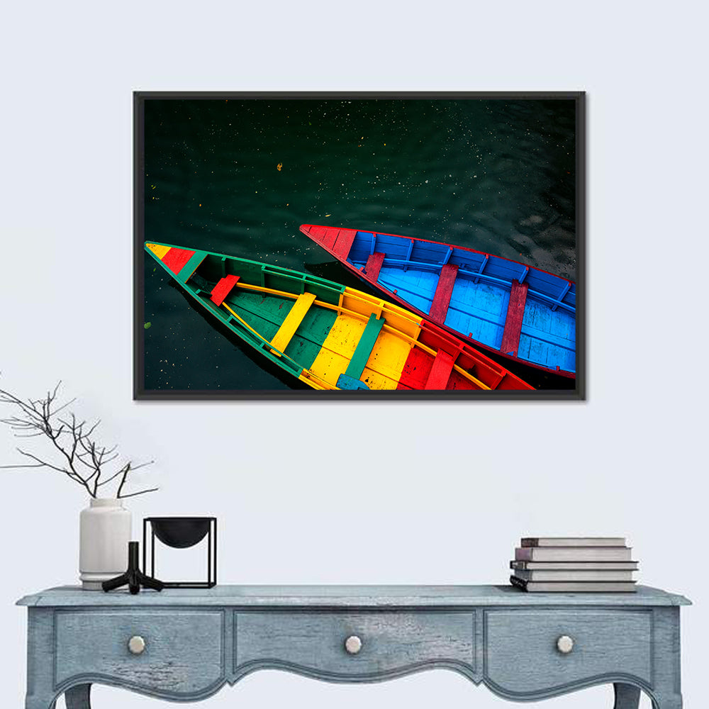 Two Colorful Boats Over Rippling Water Wall Art in a room, landscape