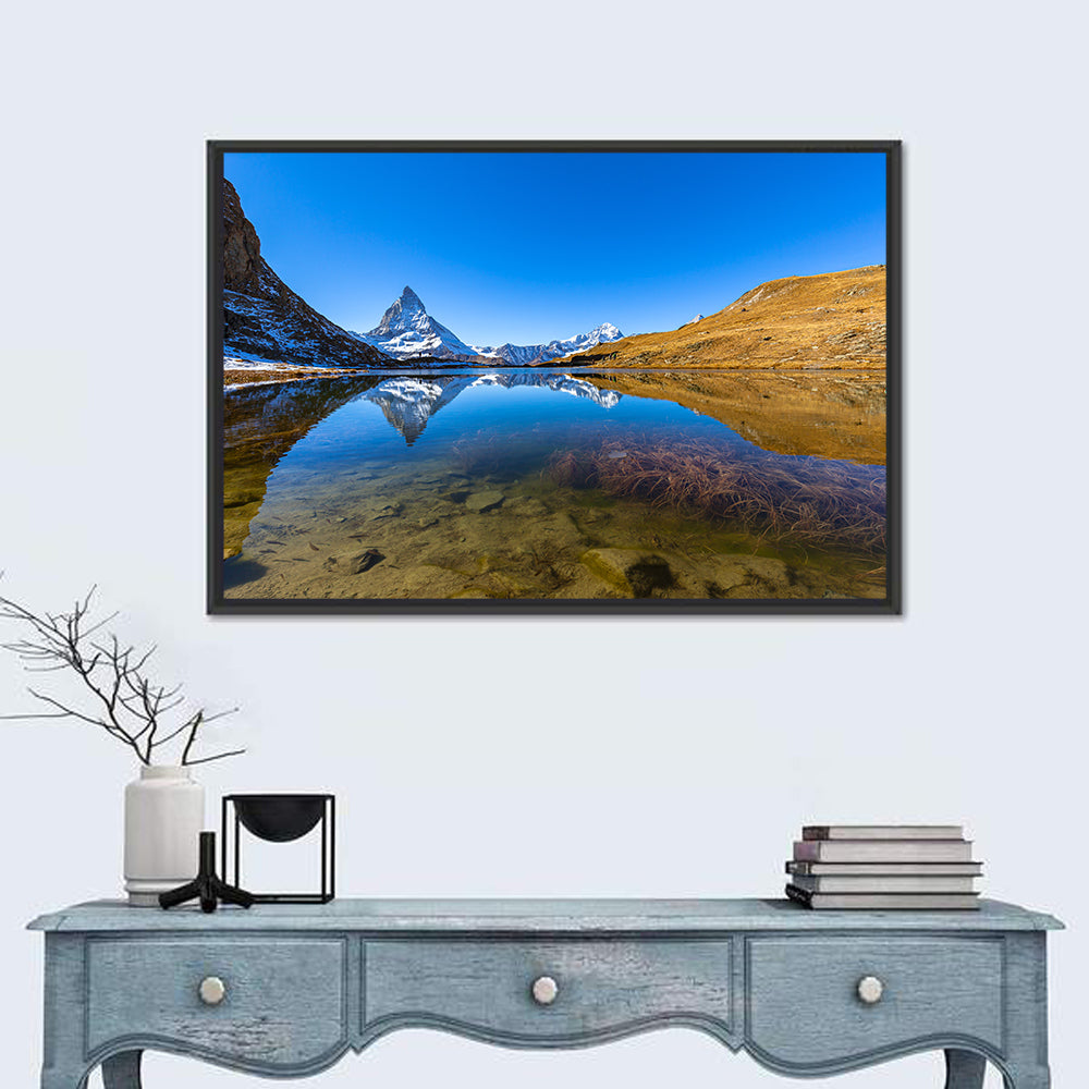 Matterhorn Reflected in Riffelsee Wall Art in a room, landscape