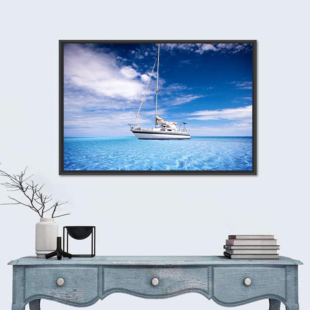 Furled Sails Over Turquoise Water Wall Art in a room, landscape