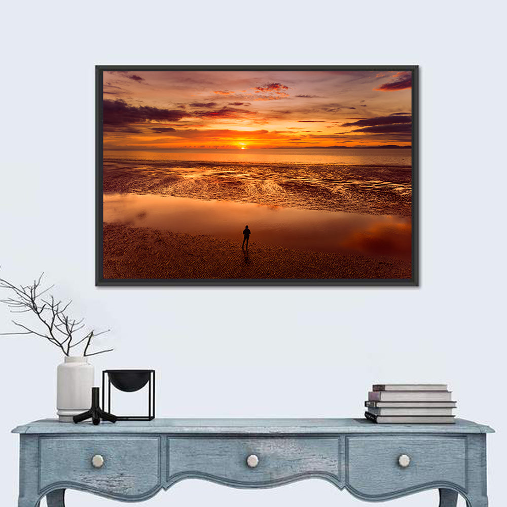 Solitary Figure on Sunset Shore Wall Art in a room, landscape