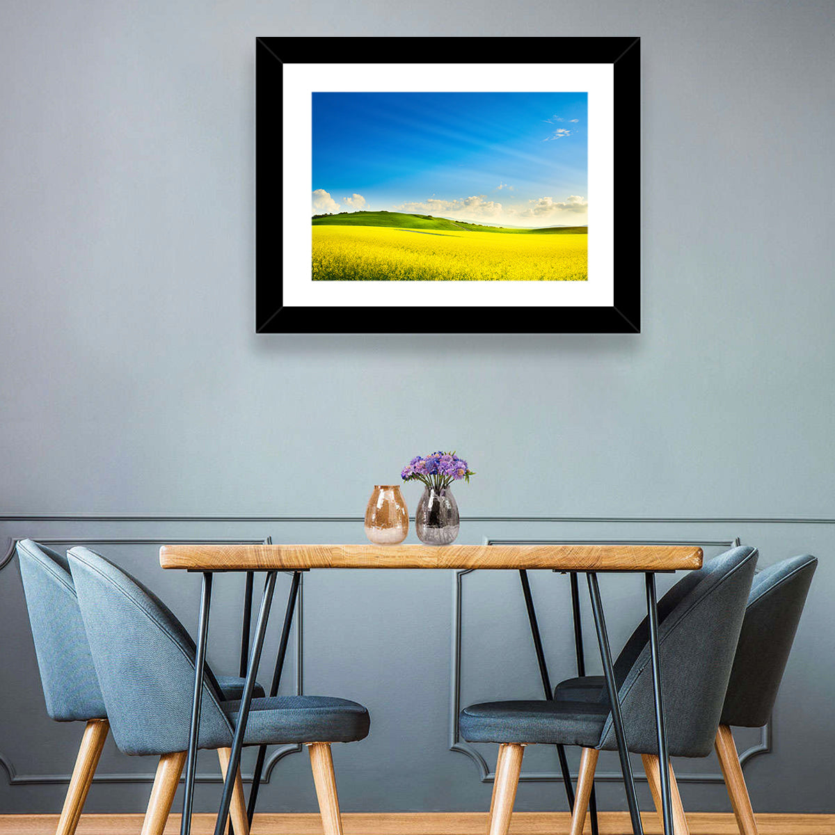 Rapeseed Field and Rolling Hills Under Blue Sky Wall Art in a room, landscape