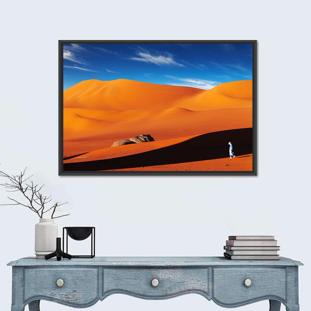Solitary Figure on Sahara Dunes Wall Art in a room, landscape