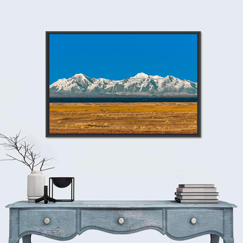 Snow-capped Peaks Over Lake Titicaca Wall Art in a room, landscape