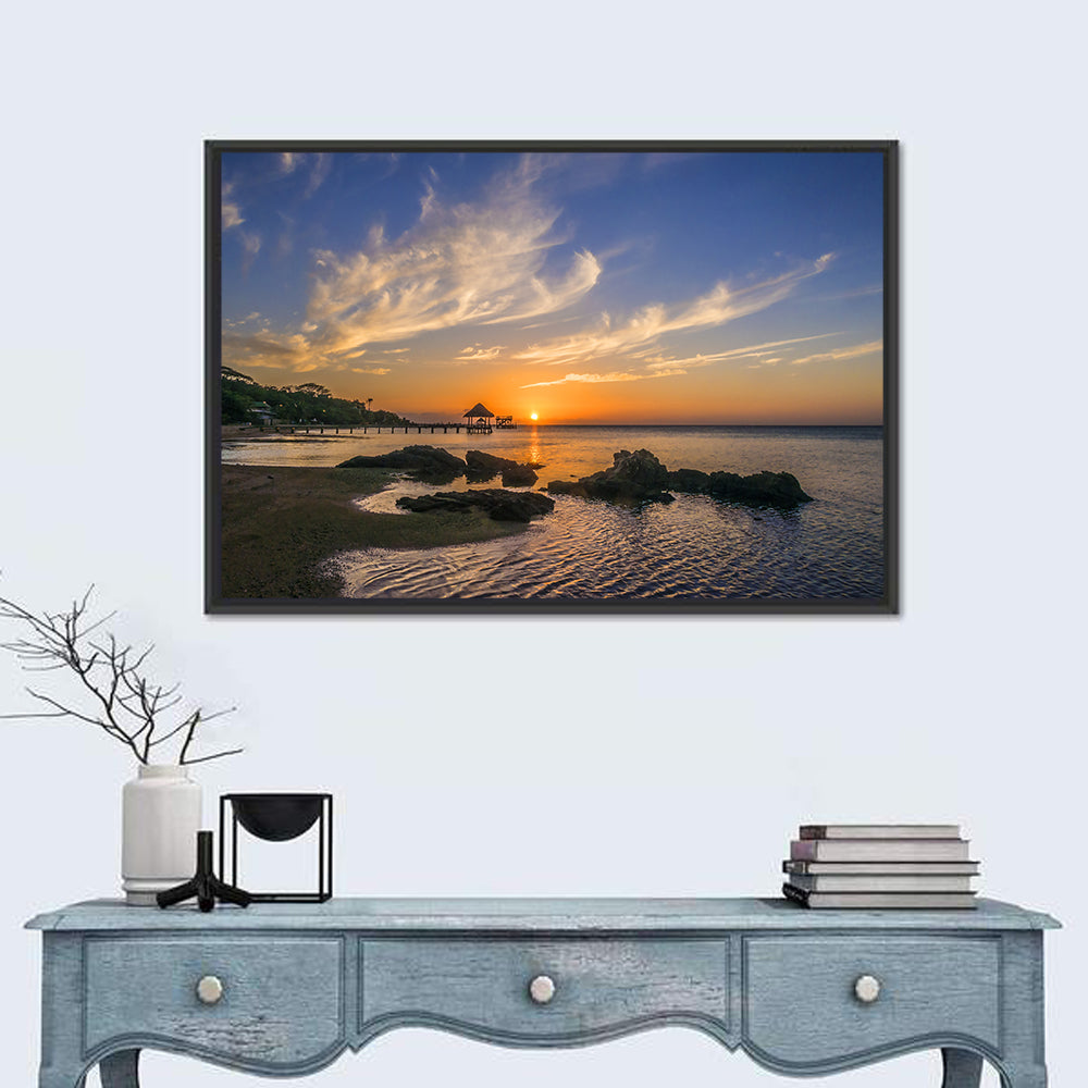 Roatan Pier Sunset Wall Art in a room, landscape