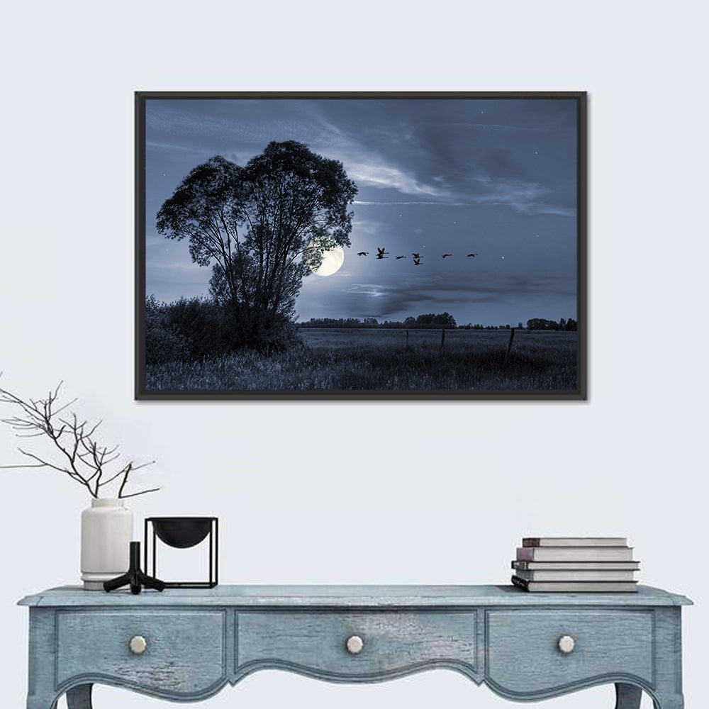 Moonlit Birds Over Quiet Field Wall Art in a room, landscape