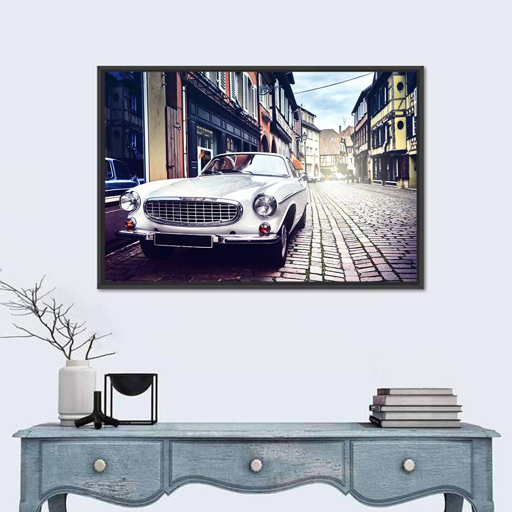 Vintage Car on Cobblestone Street Wall Art in a room, landscape