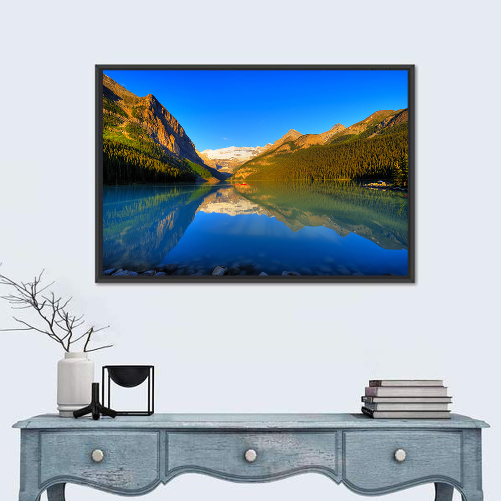 Lake Louise Canoe Reflection Wall Art in a room, landscape