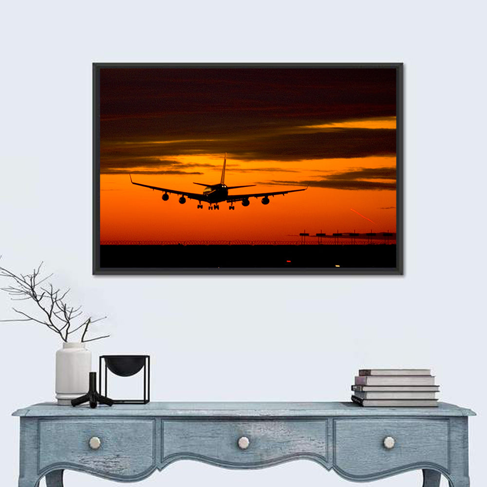 Plane Landing at Sunset Wall Art