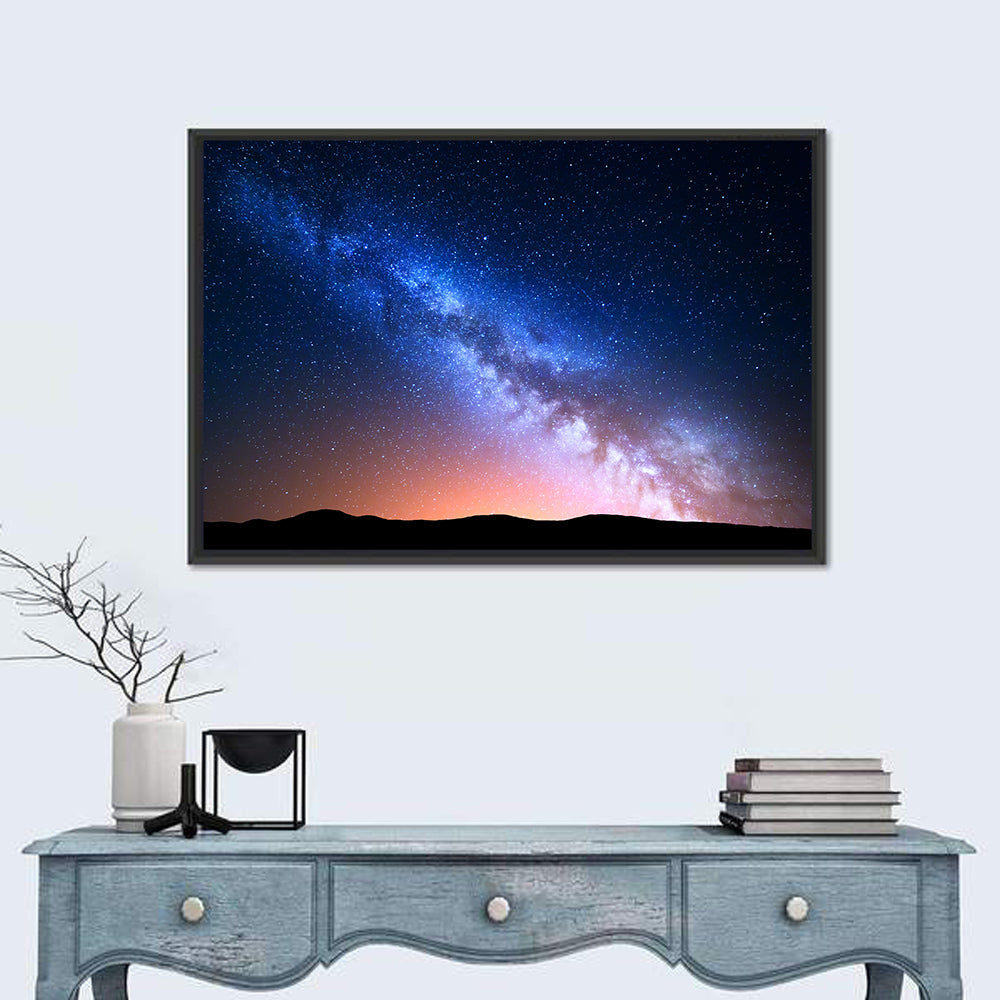 Milky Way Over Silhouetted Hills Wall Art in a room, landscape