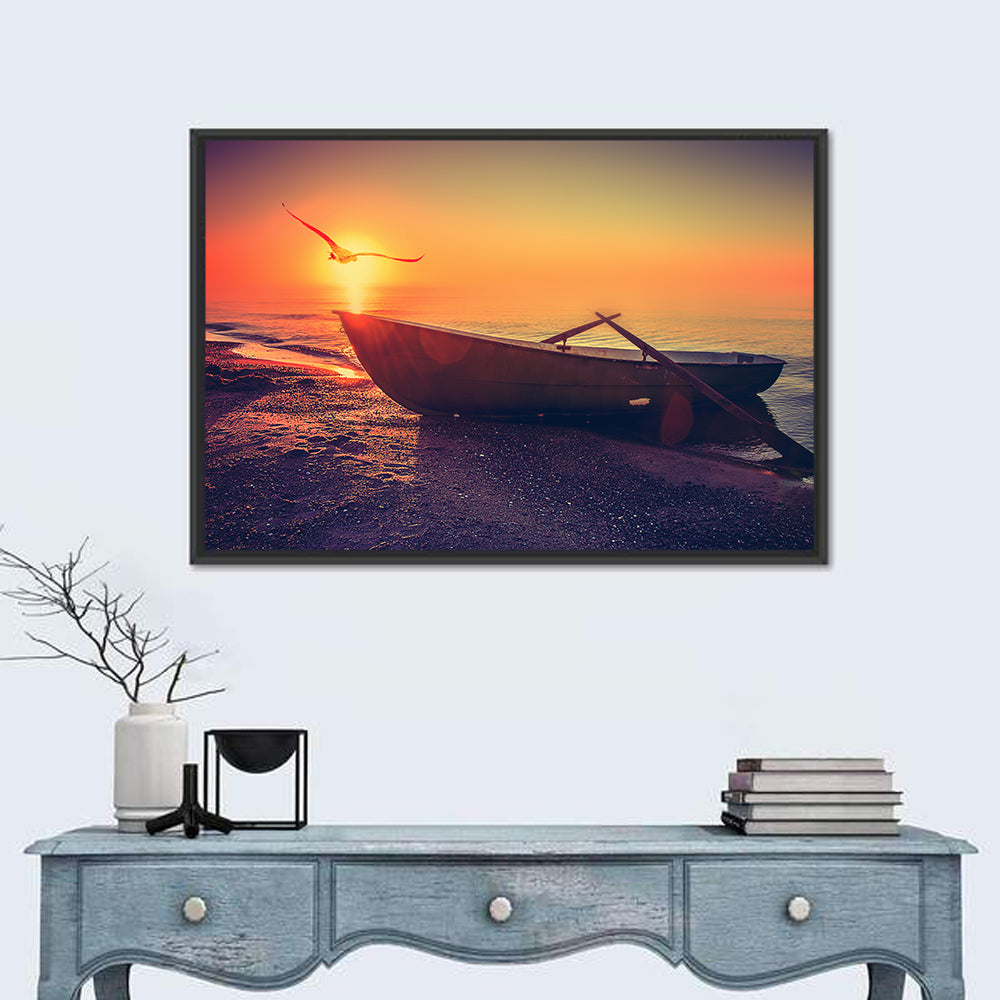 Sunset Rowboat on Sandy Shore Wall Art in a room, landscape