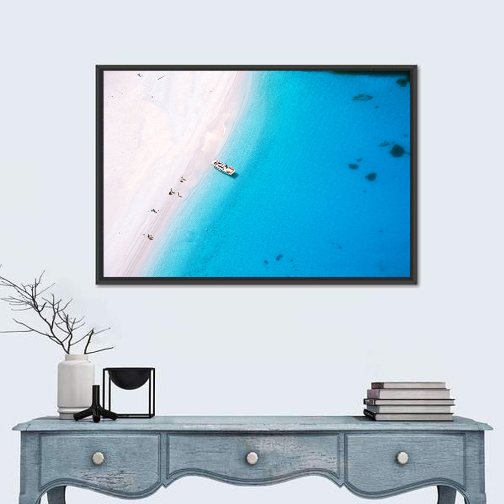 Aerial Beach Bay with White Boat Wall Art in a room, landscape