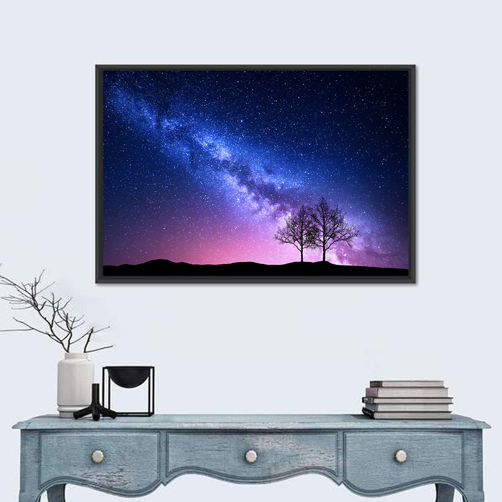 Milky Way Nebula Sky with Silhouetted Trees Wall Art in a room, landscape