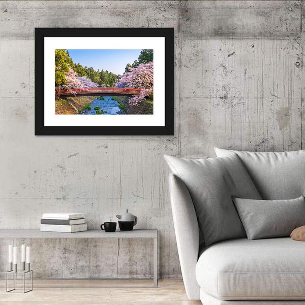 Arched Red Bridge with Cherry Blossoms Wall Art in a room, landscape
