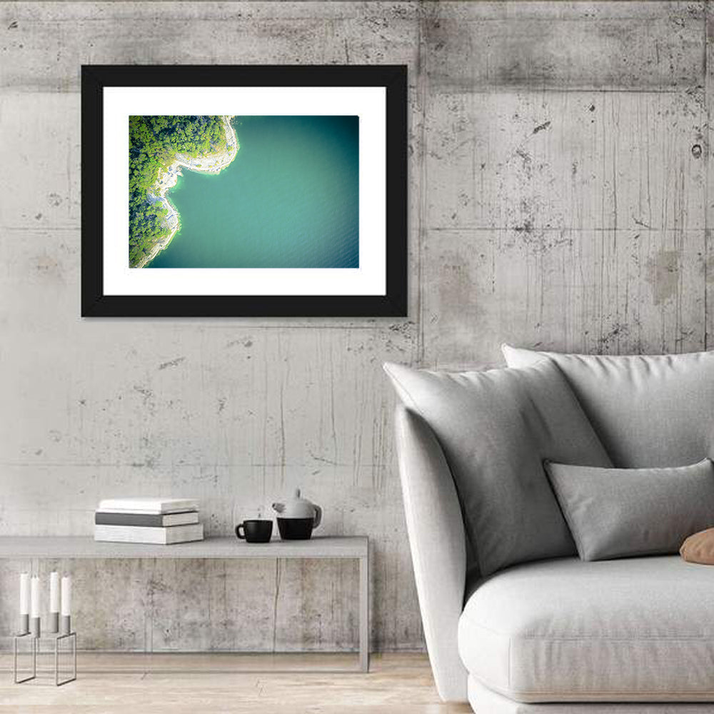 L-shaped Coastline Over Teal Lake Wall Art in a room, landscape