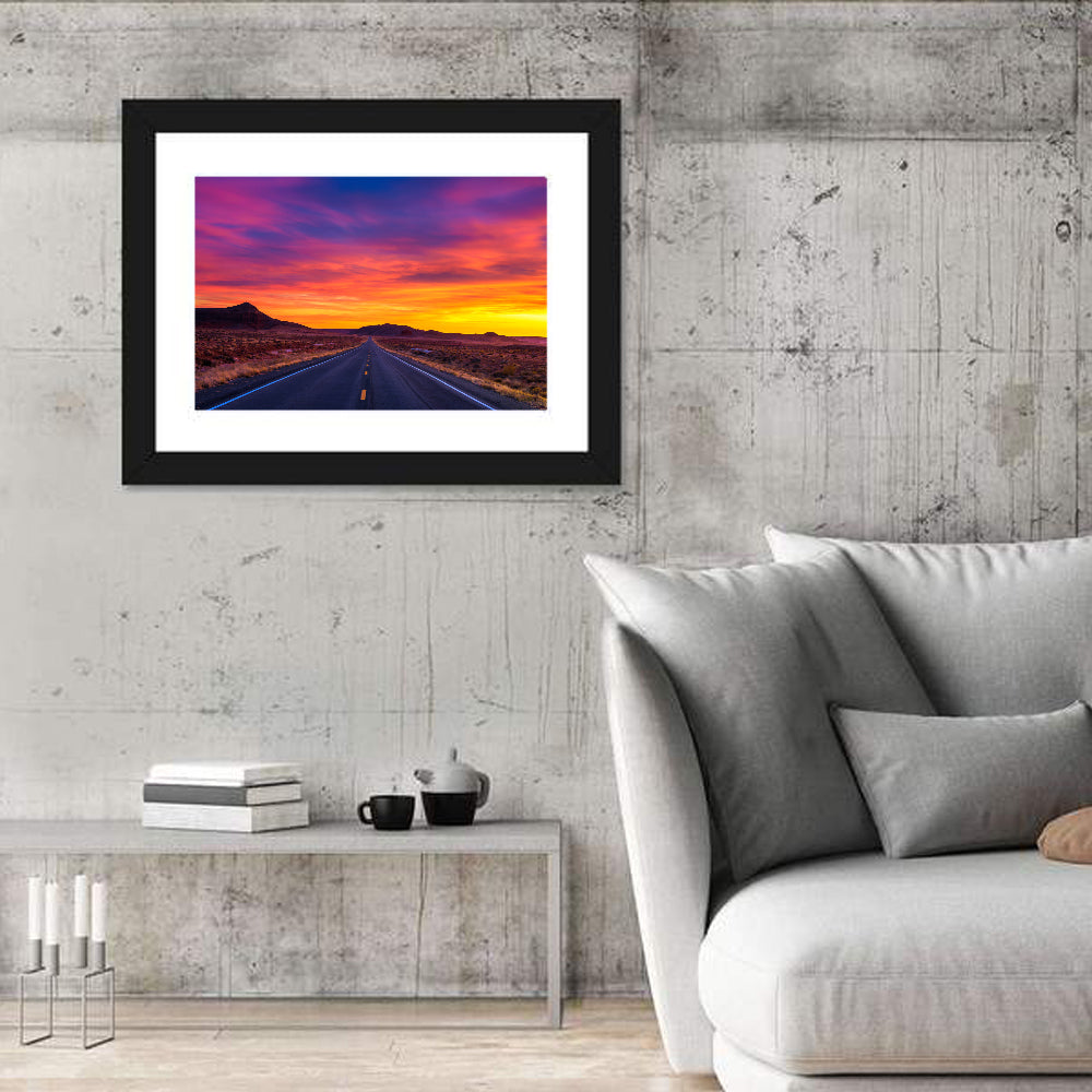 Infinite Desert Road Sunset Wall Art in a room, landscape