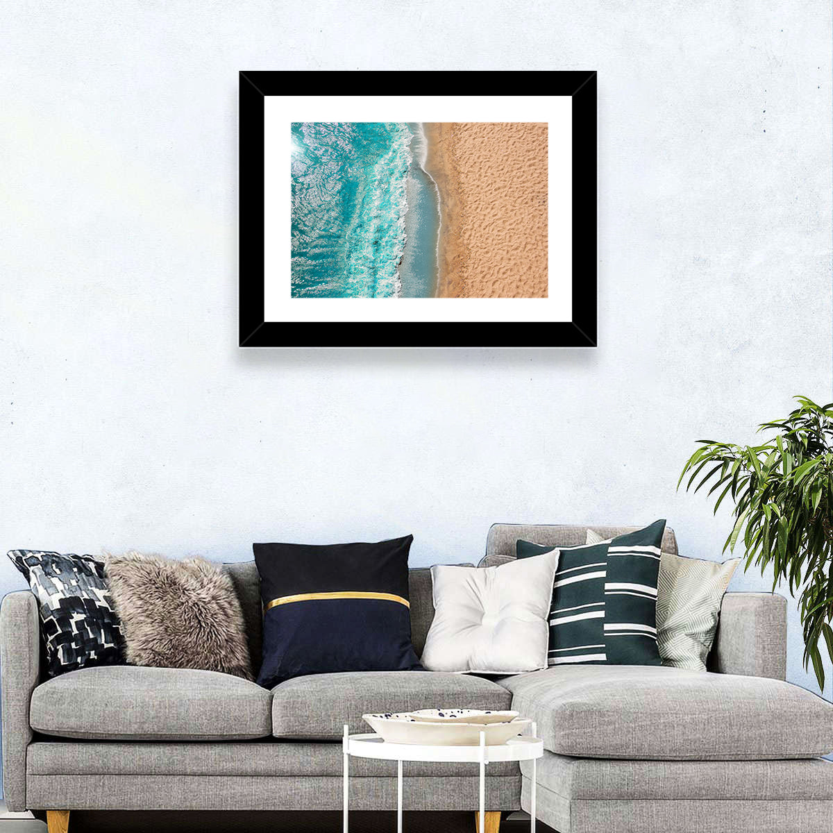 Turquoise Coastline Aerial Wall Art in a room, landscape