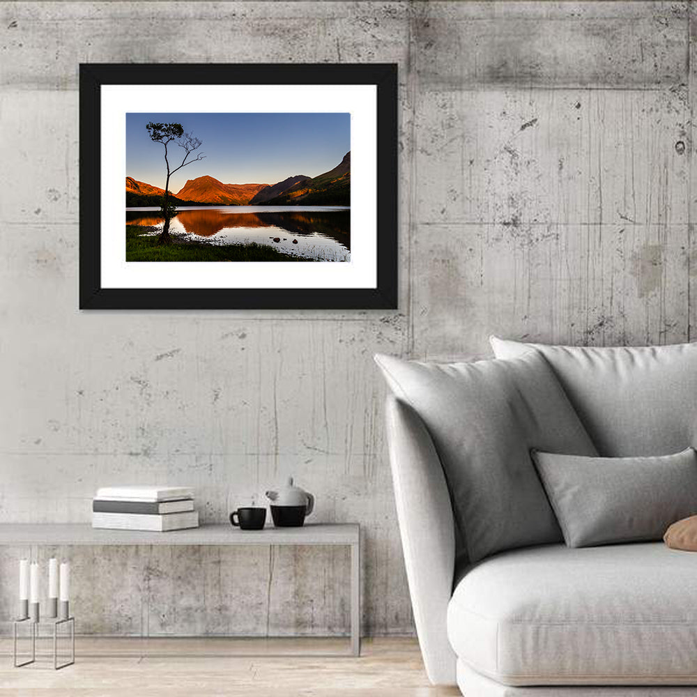 Buttermere Lone Tree Reflection Wall Art in a room, landscape