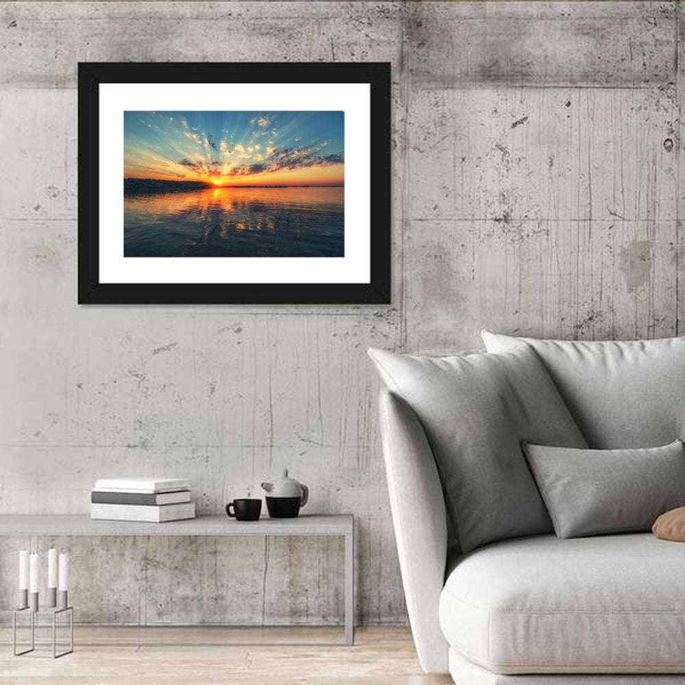 Sunburst Over River Wall Art in a room, landscape