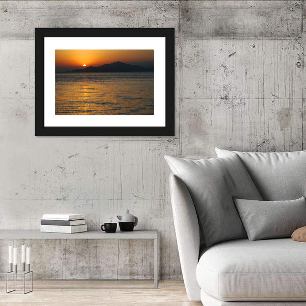 Lake Sevan Sunset Reflection Wall Art in a room, landscape