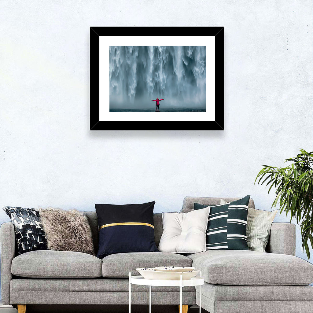 Skogafoss Waterfall with Figure in Pink Wall Art