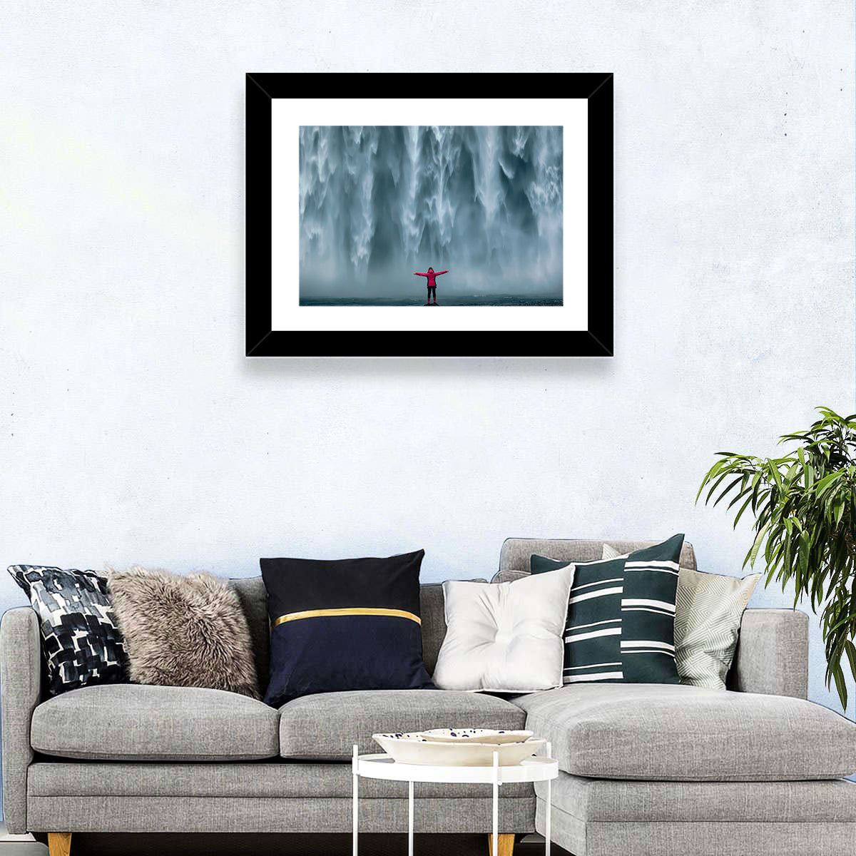 Skogafoss Waterfall with Figure in Pink Wall Art