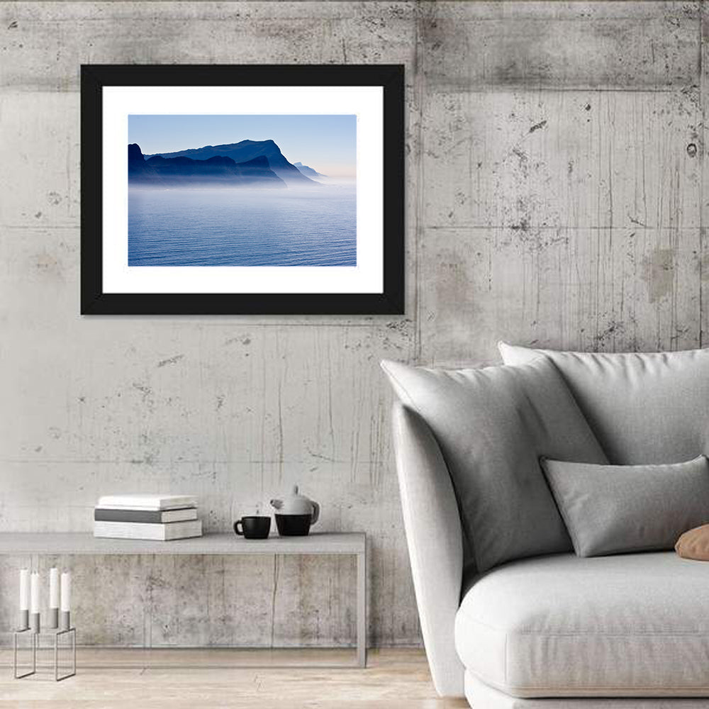 Misty Coastal Cliffs and Mountain Layers Wall Art in a room, landscape