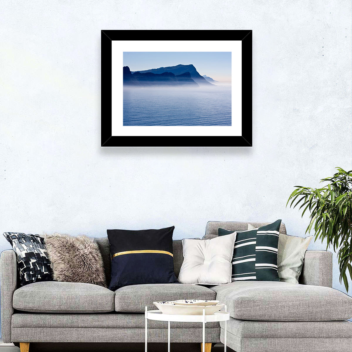 Misty Coastal Cliffs and Mountain Layers Wall Art in a room, landscape