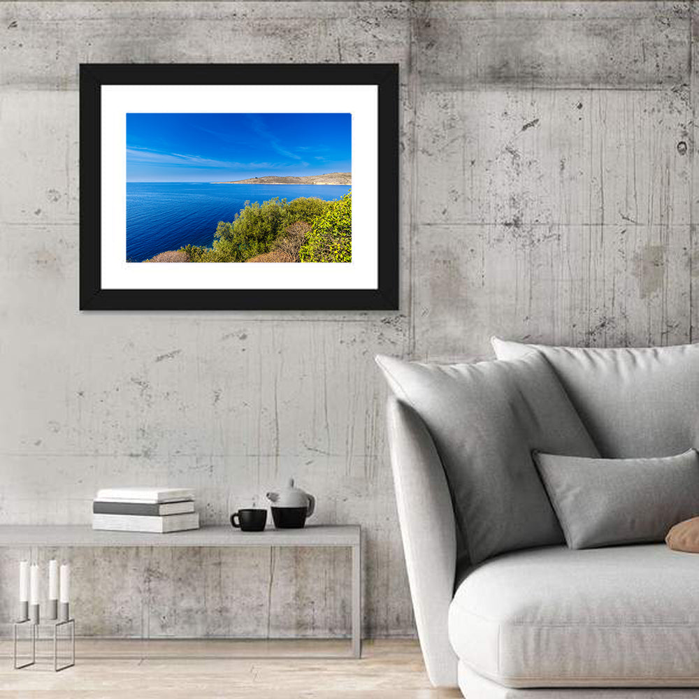 Sunlit Albanian Coastline Wall Art in a room, landscape