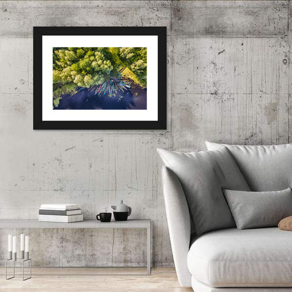Cluster of Boats Along Forest Shore Wall Art in a room, landscape