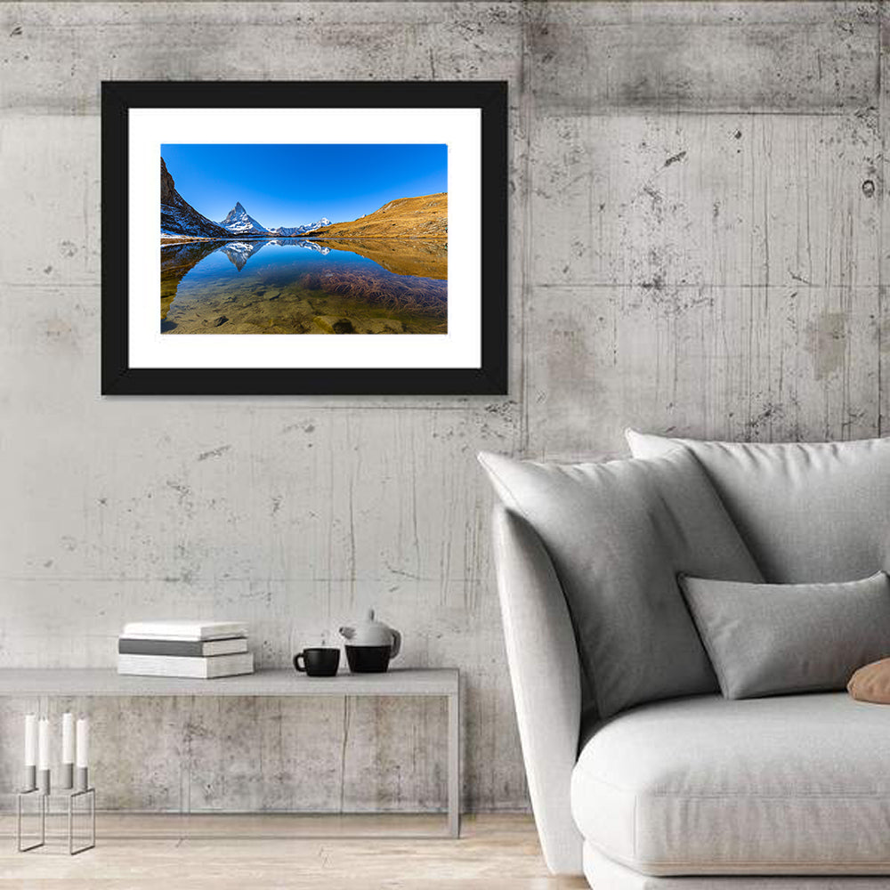 Matterhorn Reflected in Riffelsee Wall Art in a room, landscape
