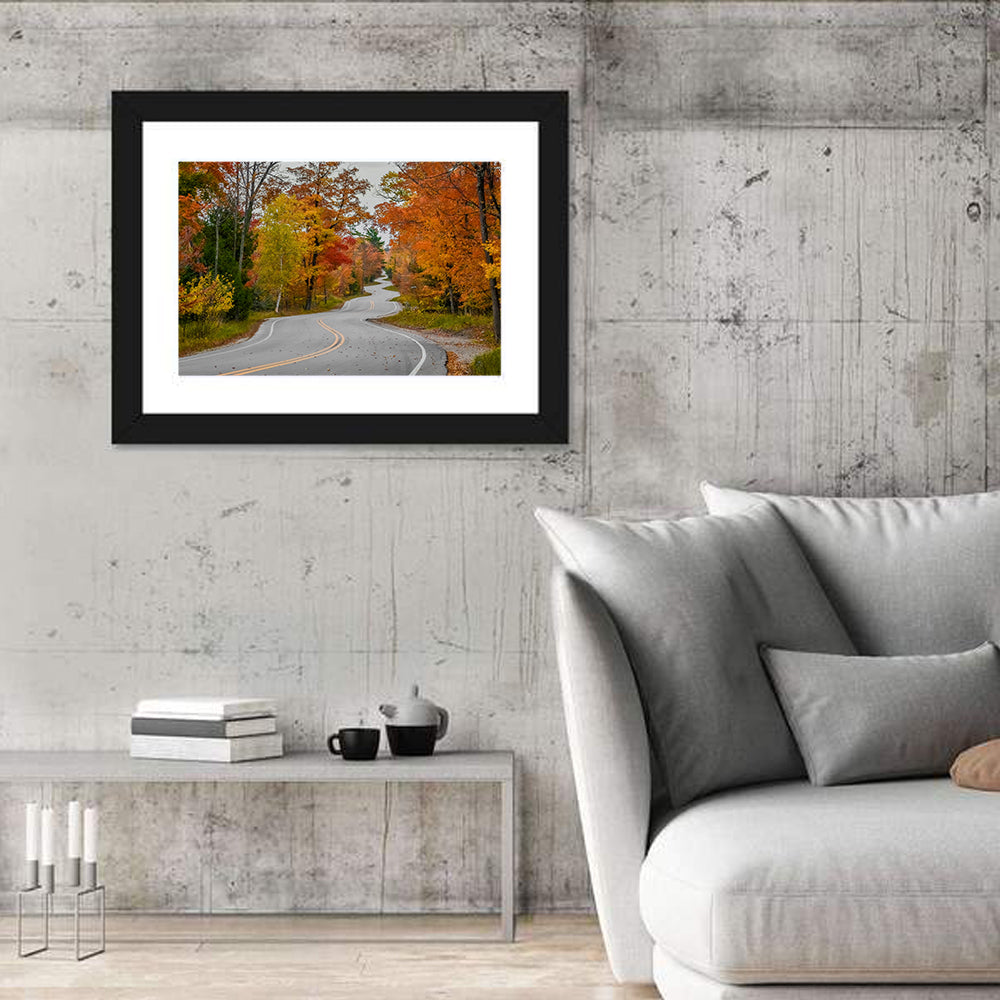 Winding Autumn Highway Wall Art in a room, landscape