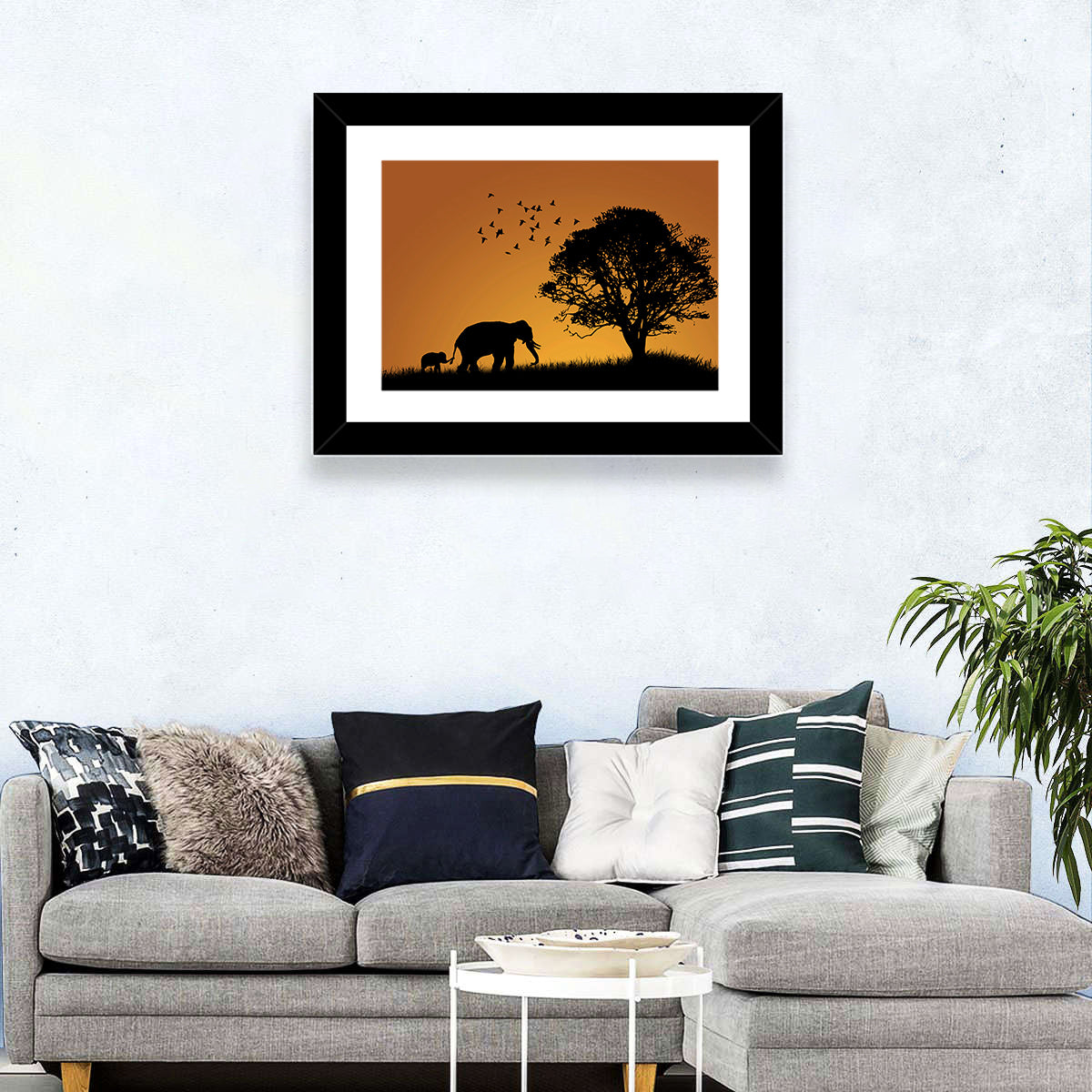 Elephant Family at Golden Sunset Wall Art in a room, landscape