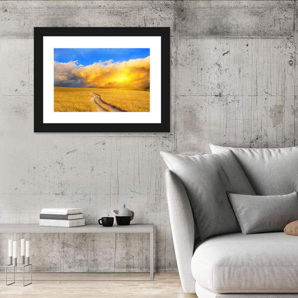 Sunlit Meadow Path with Dramatic Clouds Wall Art in a room, landscape