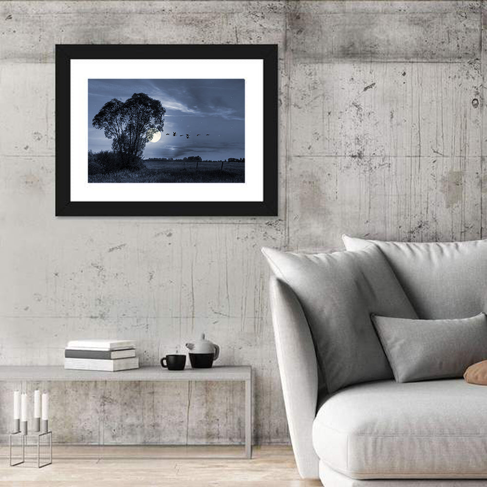 Moonlit Birds Over Quiet Field Wall Art in a room, landscape