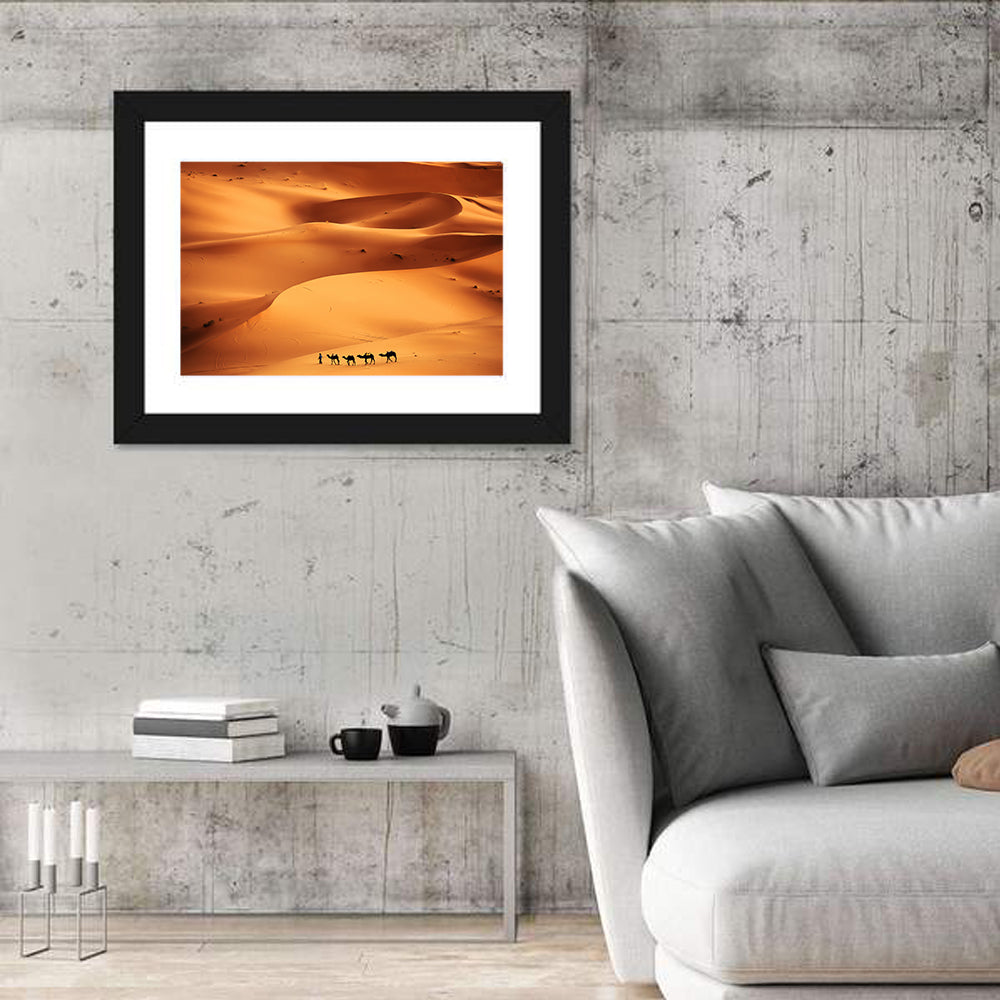 Desert Camel Caravan in Golden Dunes Wall Art in a room, landscape