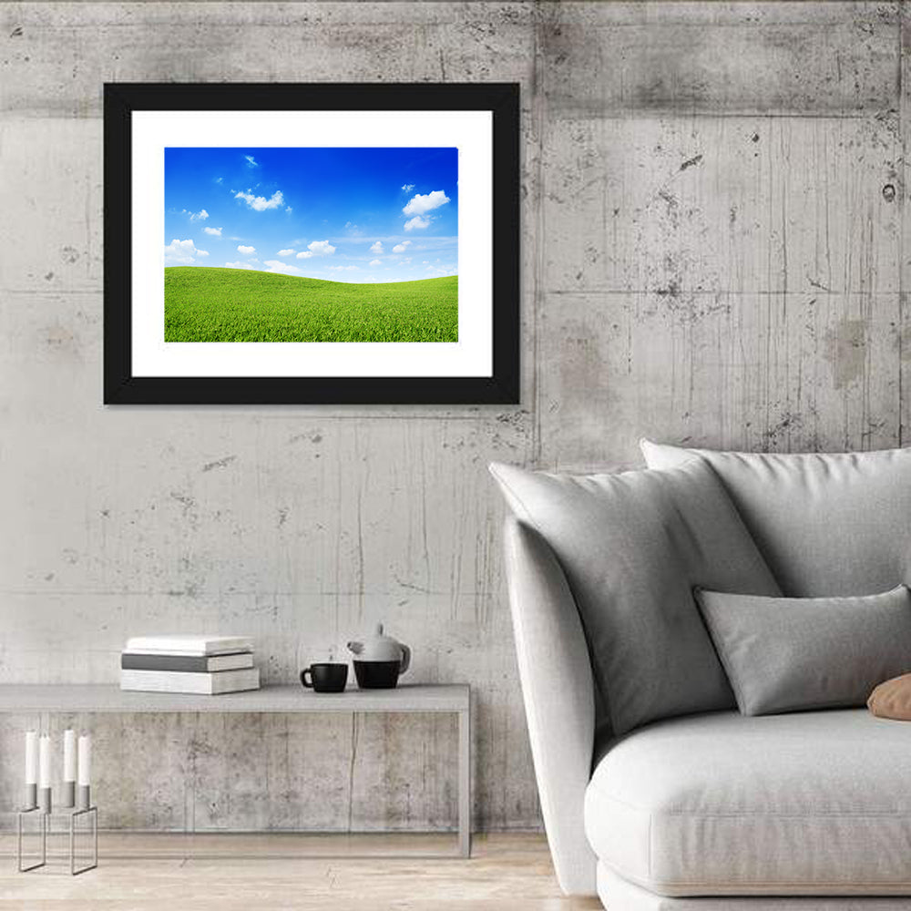 Rolling Green Meadow Under Blue Sky Wall Art in a room, landscape