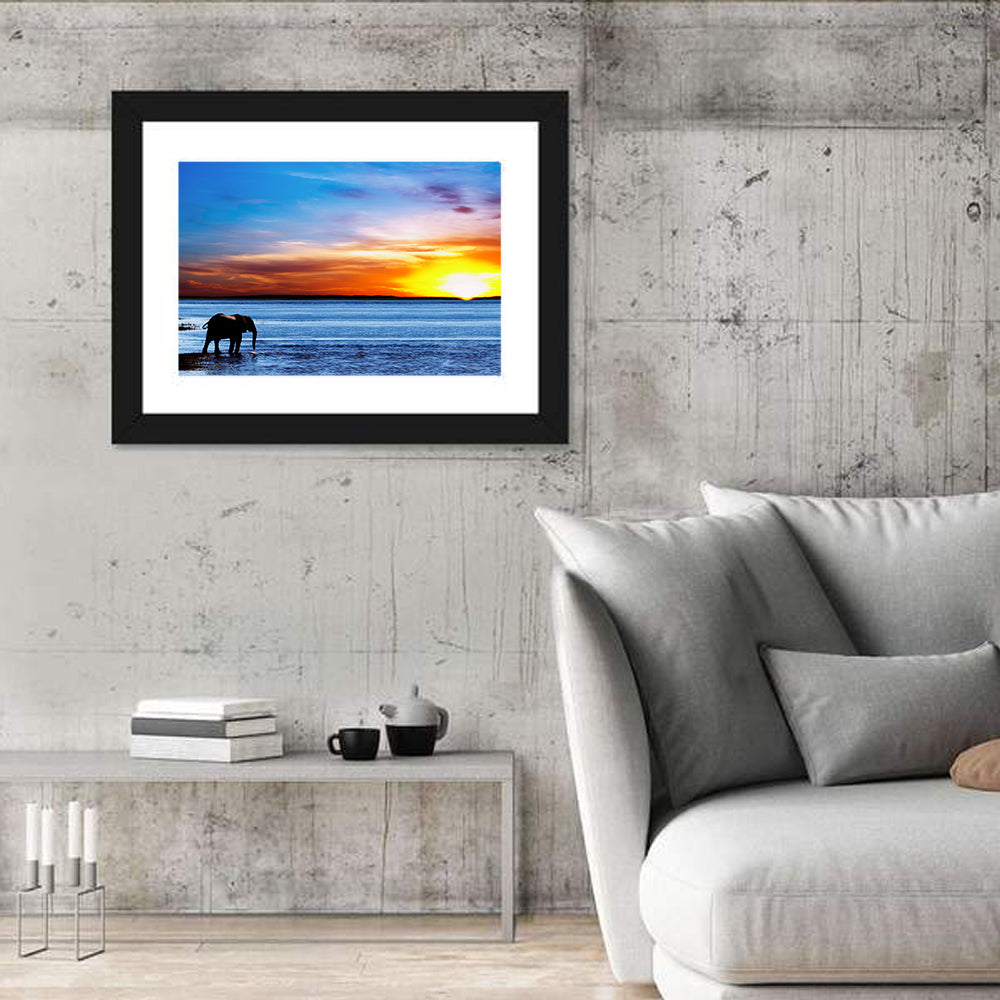 Elephant Silhouette at Beach Sunset Wall Art in a room, landscape