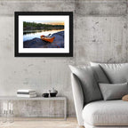 Orange Kayak on Rocky Shore Wall Art
