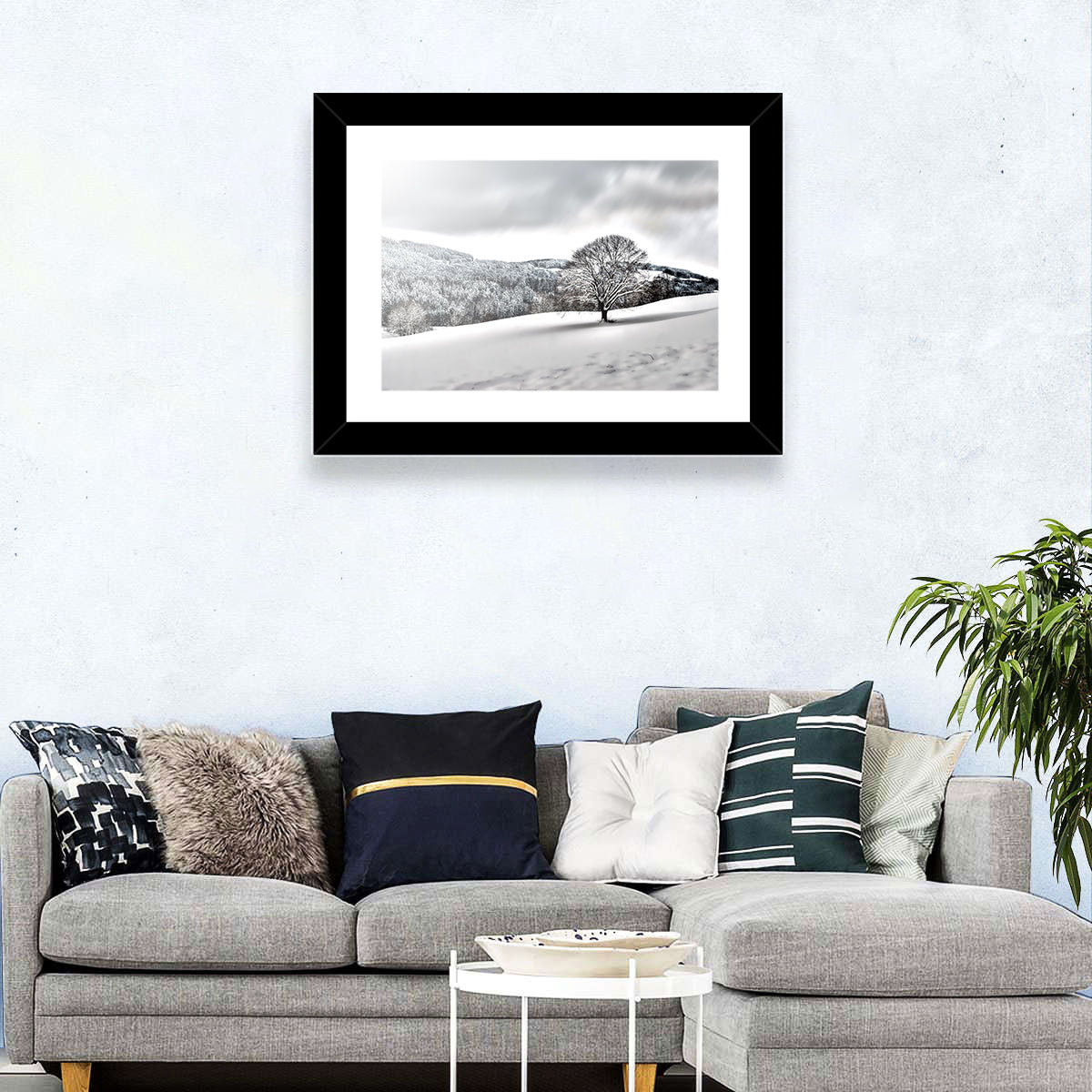 Solitary Snowy Tree Landscape Wall Art in a room, landscape
