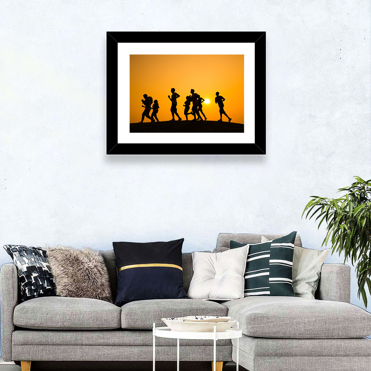Six Runners Silhouette at Golden Sunset Wall Art in a room, landscape