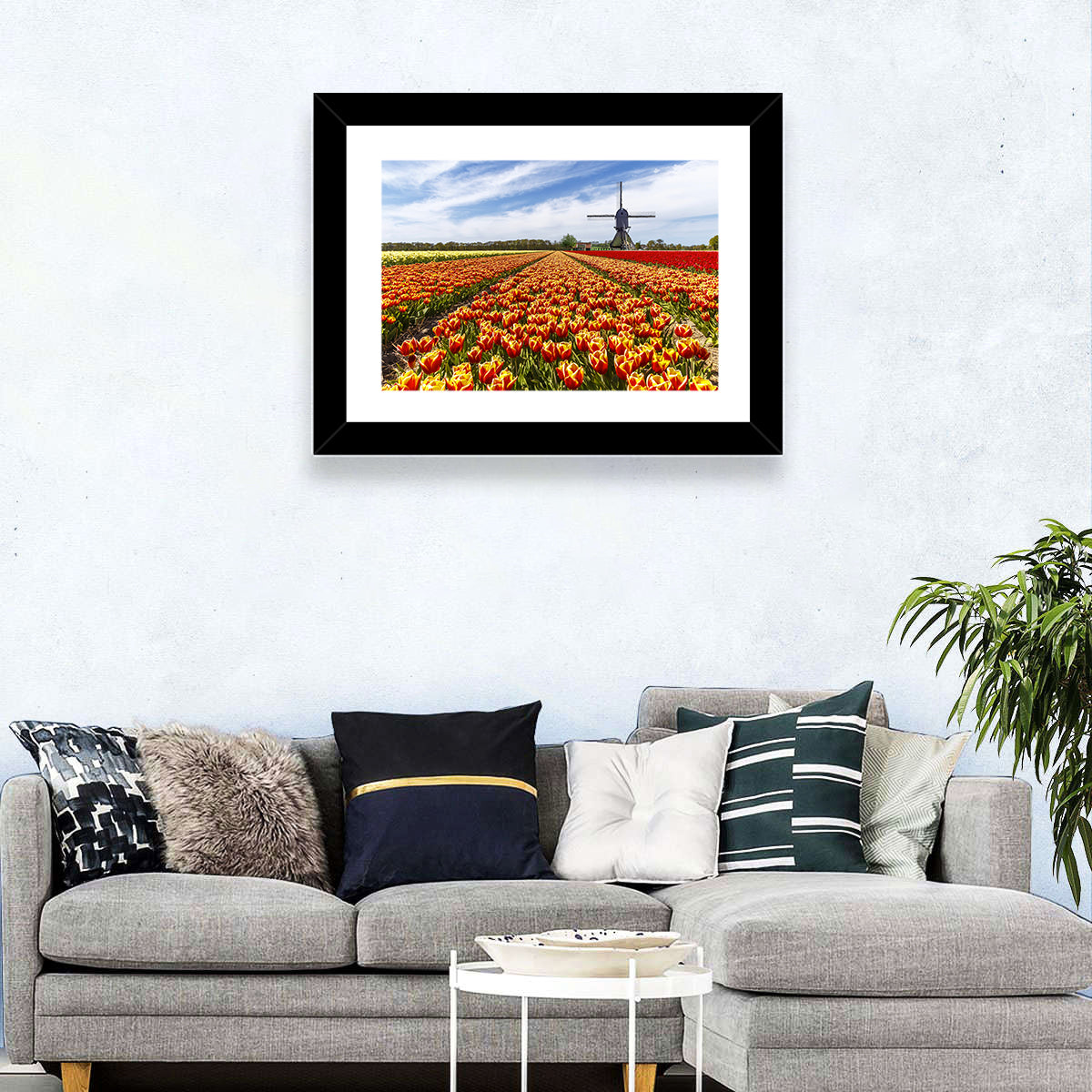 Windmill Over Tulip Fields Wall Art in a room, landscape