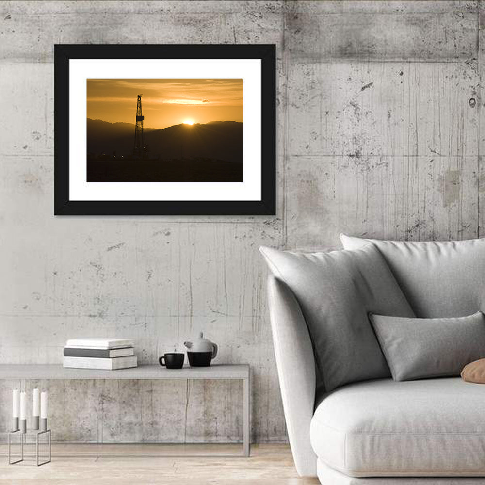 Sunrise Over Drilling Rig Wall Art in a room, landscape
