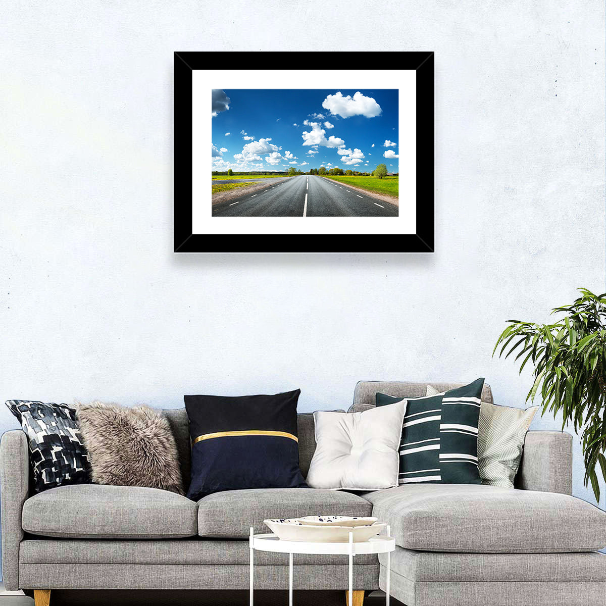 Asphalt Road Through Meadow Wall Art in a room, landscape