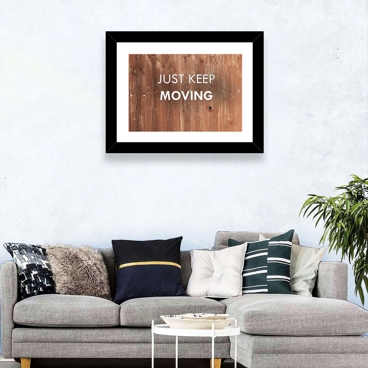 Just Keep Moving Rustic Quote Wall Art in a room, landscape