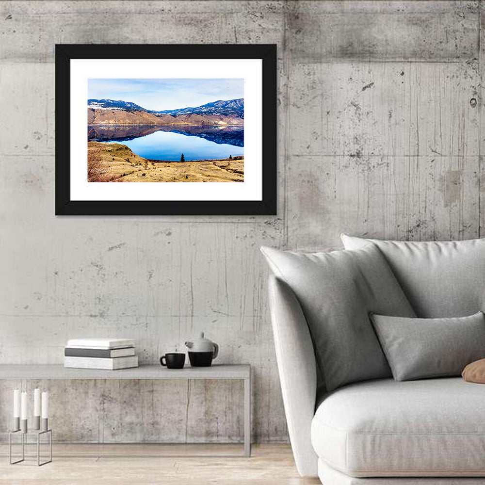 Kamloops Lake Sunset with Snow Capped Peaks Wall Art in a room, landscape